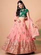 Glamorous Peach Mirror Work Net Wedding Wear Lehenga Choli