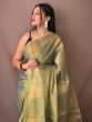 Entrancing Green Zari Weaving Tissue Silk Saree With Blouse