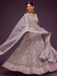 Attractive Lilac Embroidered Soft Net Wedding Wear Lehenga Choli 
